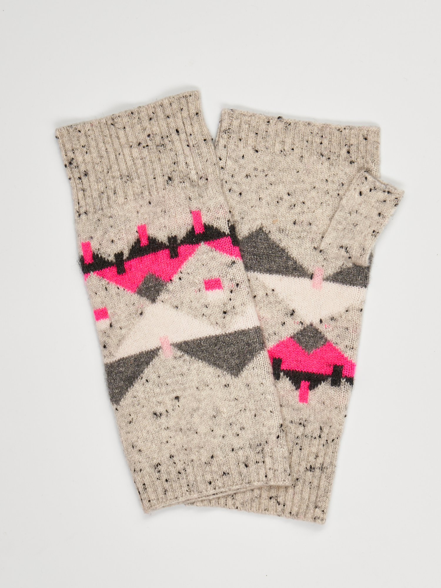 Flat lay of grey and pink patterned wrist warmers